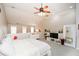 Luxurious main bedroom with high ceilings, a large TV, and plenty of light at 4754 Ivy Ridge Se Dr # 1, Atlanta, GA 30339