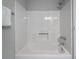 Clean white bathtub/shower combination in a simple bathroom at 134 Springstead Sw Ct, Marietta, GA 30060