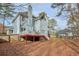 Elevated back deck and fenced backyard with trees at 1463 Wood Park Nw Way, Kennesaw, GA 30152