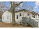 Charming single-story home with a gray staircase and white siding at 6214 Hagin St, Douglasville, GA 30134