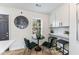 Breakfast nook in the kitchen with a round table and stylish green velvet chairs at 1147 Graymont Sw Dr, Atlanta, GA 30310