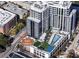 Aerial view of modern building with pool and tennis court at 2425 Peachtree Ne Rd # 510, Atlanta, GA 30305