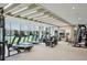 Modern fitness center with cardio equipment, weights, and natural light at 2425 Peachtree Ne Rd # 510, Atlanta, GA 30305