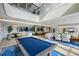 Spacious game room with pool table, seating, TV, and dining area at 2425 Peachtree Ne Rd # 510, Atlanta, GA 30305
