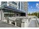 Outdoor grilling station with stainless steel grills and seating area at 2425 Peachtree Ne Rd # 510, Atlanta, GA 30305