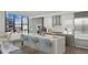 Modern kitchen with island, stainless steel appliances, and city views at 2425 Peachtree Ne Rd # 510, Atlanta, GA 30305