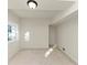 Bright, open basement space with neutral walls and carpeting at 2480 Miriam Ln, Decatur, GA 30032