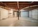 Partially finished basement with garage doors and mechanicals at 3930 Wedgefield Cir, Decatur, GA 30035