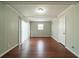 Bonus room with wood-look floors, sliding glass doors, and neutral paint at 3930 Wedgefield Cir, Decatur, GA 30035