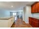 Kitchen with granite countertops, an island, wood cabinets, and stainless steel appliances at 3930 Wedgefield Cir, Decatur, GA 30035