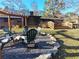 Relaxing fire pit area with seating and pergola at 2691 Millwood Ct, Decatur, GA 30033