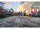 Large, fenced backyard with a deck and play area at 907 Hannah Ct, Loganville, GA 30052