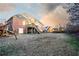Spacious backyard with a deck, playset, and fenced yard at 907 Hannah Ct, Loganville, GA 30052
