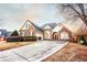 Charming two-story brick home with a long driveway and landscaped yard at 907 Hannah Ct, Loganville, GA 30052