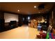 Home theater with projector, screen, and storage at 907 Hannah Ct, Loganville, GA 30052