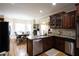 Kitchen featuring an island, stainless steel appliances, and breakfast nook at 907 Hannah Ct, Loganville, GA 30052