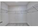 Spacious walk-in closet with built-in shelving at 1611 Aiden Way # 53, Conyers, GA 30013