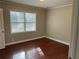 Bright bedroom with hardwood floors and large windows at 1670 Avon Sw Ave, Atlanta, GA 30311