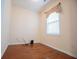 Empty bedroom with neutral walls and hardwood floors, ready for personalization at 3680 Long Lake Dr, Douglasville, GA 30135