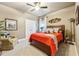 Cozy bedroom with a comfortable bed and plenty of light at 595 Everton Pl, Grayson, GA 30017