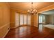 Dining room with hardwood floors, chandelier, and bay window at 750 Mount Vernon Hwy, Atlanta, GA 30327