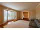 Spacious living room with hardwood floors, bay window, and neutral walls at 750 Mount Vernon Hwy, Atlanta, GA 30327