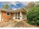 Screened porch attached to a brick house at 750 Mount Vernon Hwy, Atlanta, GA 30327