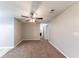 Bright living room featuring neutral walls and carpet at 7355 Little Fawn Pkwy, Palmetto, GA 30268