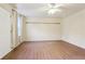 Spacious bedroom featuring hardwood floors and a ceiling fan at 3188 Warrenton Ct, Douglasville, GA 30135