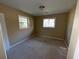 Vacant bedroom with carpet flooring and two windows at 2228 Emerald Castle Dr, Decatur, GA 30035