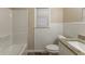 Bathroom with tiled walls, shower/tub combo, and granite vanity at 453 Utoy Sw Cir, Atlanta, GA 30331