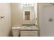 Bathroom with granite vanity, shower, and toilet at 453 Utoy Sw Cir, Atlanta, GA 30331