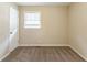 Empty bedroom with carpet and single window at 453 Utoy Sw Cir, Atlanta, GA 30331