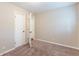 Empty bedroom with carpet flooring and open door at 453 Utoy Sw Cir, Atlanta, GA 30331