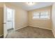 Cozy bedroom with carpeted flooring and an ensuite bathroom at 453 Utoy Sw Cir, Atlanta, GA 30331