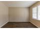 Inviting living room with ample natural light and durable wood-look flooring at 453 Utoy Sw Cir, Atlanta, GA 30331