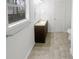 Bathroom with vanity, mirror, and towel rack at 4727 Garden Hills Dr, Stone Mountain, GA 30083
