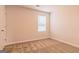 Unfurnished bedroom with neutral walls and carpet flooring at 1628 Fuma Leaf Way, Mcdonough, GA 30253