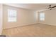 Spacious bedroom with ceiling fan and windows at 1628 Fuma Leaf Way, Mcdonough, GA 30253