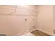 Laundry room with wire shelving, washer/dryer hookups, and tiled floor at 1628 Fuma Leaf Way, Mcdonough, GA 30253