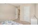 Bedroom with floral bedspread, white dresser, and closet doors at 2137 Belmont Cir, Conyers, GA 30012