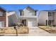 Charming two-story home with a one-car garage and a driveway at 2137 Belmont Cir, Conyers, GA 30012