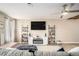 Spacious living area with comfortable seating, a fireplace, and modern decor at 2137 Belmont Cir, Conyers, GA 30012