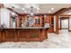 Large basement bar with ample counter space and custom cabinetry at 3229 Carmichael Pl, Duluth, GA 30097