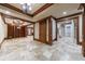 Basement area with built-in bookshelves and tile floor at 3229 Carmichael Pl, Duluth, GA 30097