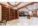 Basement with bookshelves, entertainment area, and wet bar at 3229 Carmichael Pl, Duluth, GA 30097