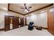 Basement room with a massage chair, storage closet, and ceiling fan at 3229 Carmichael Pl, Duluth, GA 30097