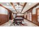Finished basement with pool table, tile floors, wood paneling, and multiple windows at 3229 Carmichael Pl, Duluth, GA 30097