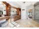 Elegant bathroom with dual vanities, wood cabinetry, and tile floors at 3229 Carmichael Pl, Duluth, GA 30097