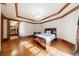 Bedroom with hardwood floors, walk-in closet, and ample natural light at 3229 Carmichael Pl, Duluth, GA 30097